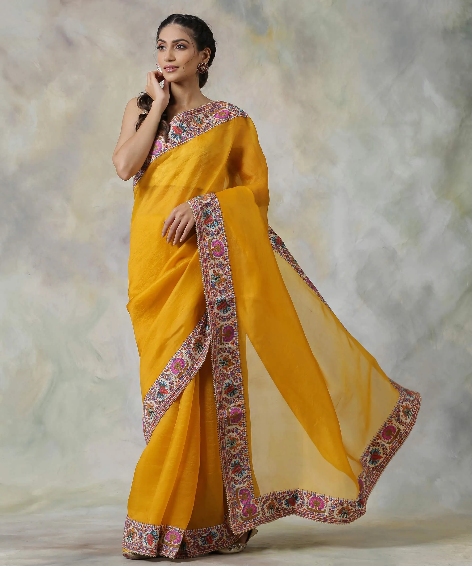 Mustard Handloom Organza Saree with Hand Appliqued Sozni Needle Work Border