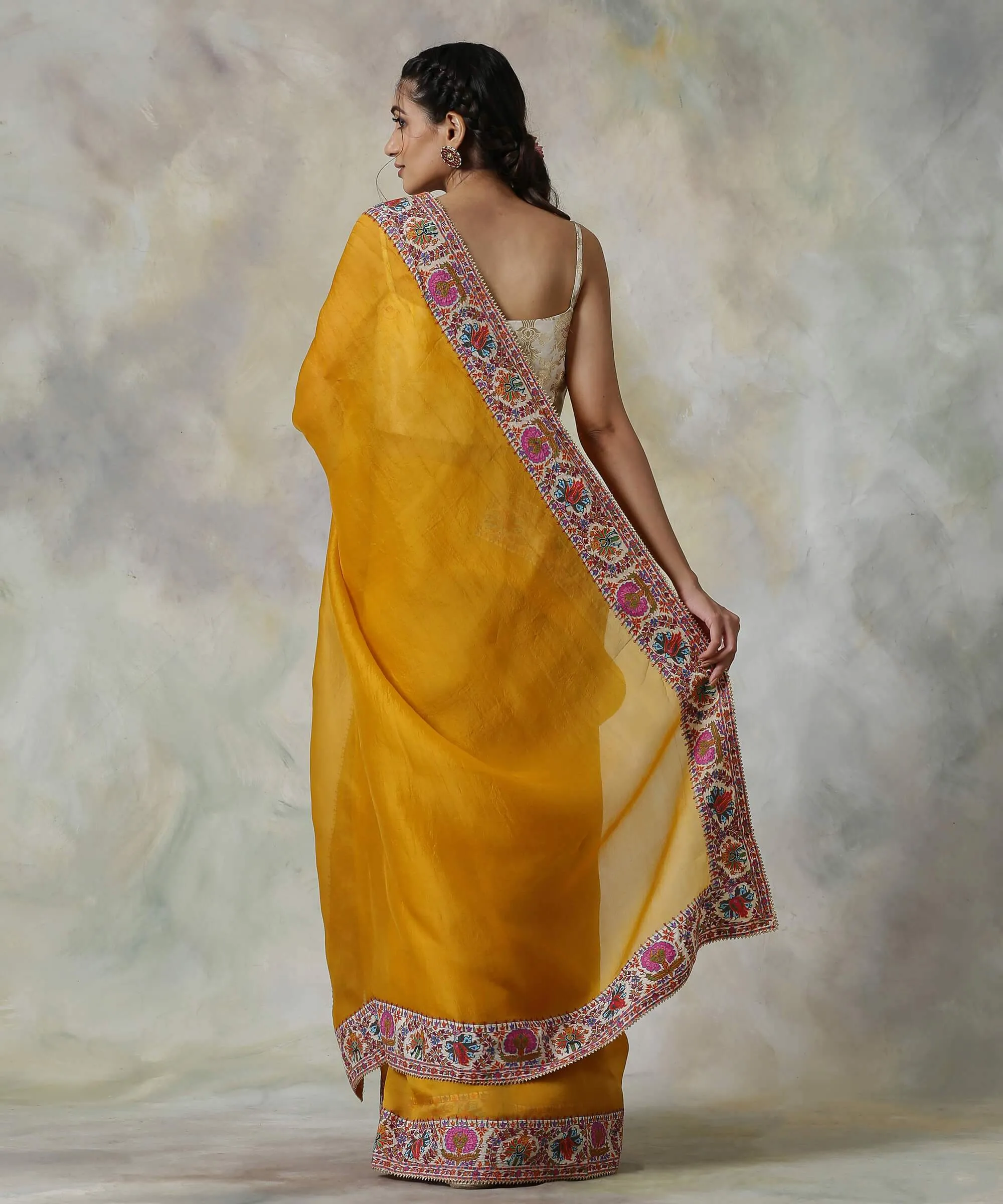 Mustard Handloom Organza Saree with Hand Appliqued Sozni Needle Work Border