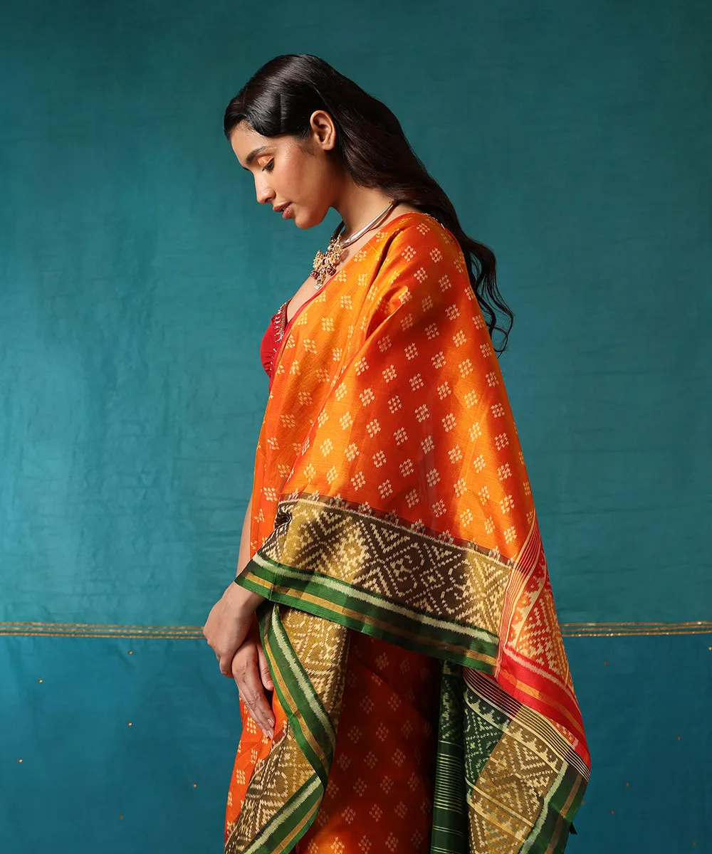 Red And Orange Handloom Pure Mulberry Silk Ikat Patola Saree With Green Geometrical Border