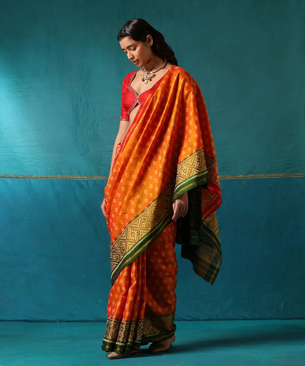 Red And Orange Handloom Pure Mulberry Silk Ikat Patola Saree With Green Geometrical Border